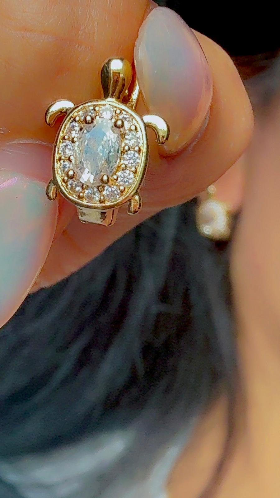 Cute animal-inspired stud earrings with gold and crystal details