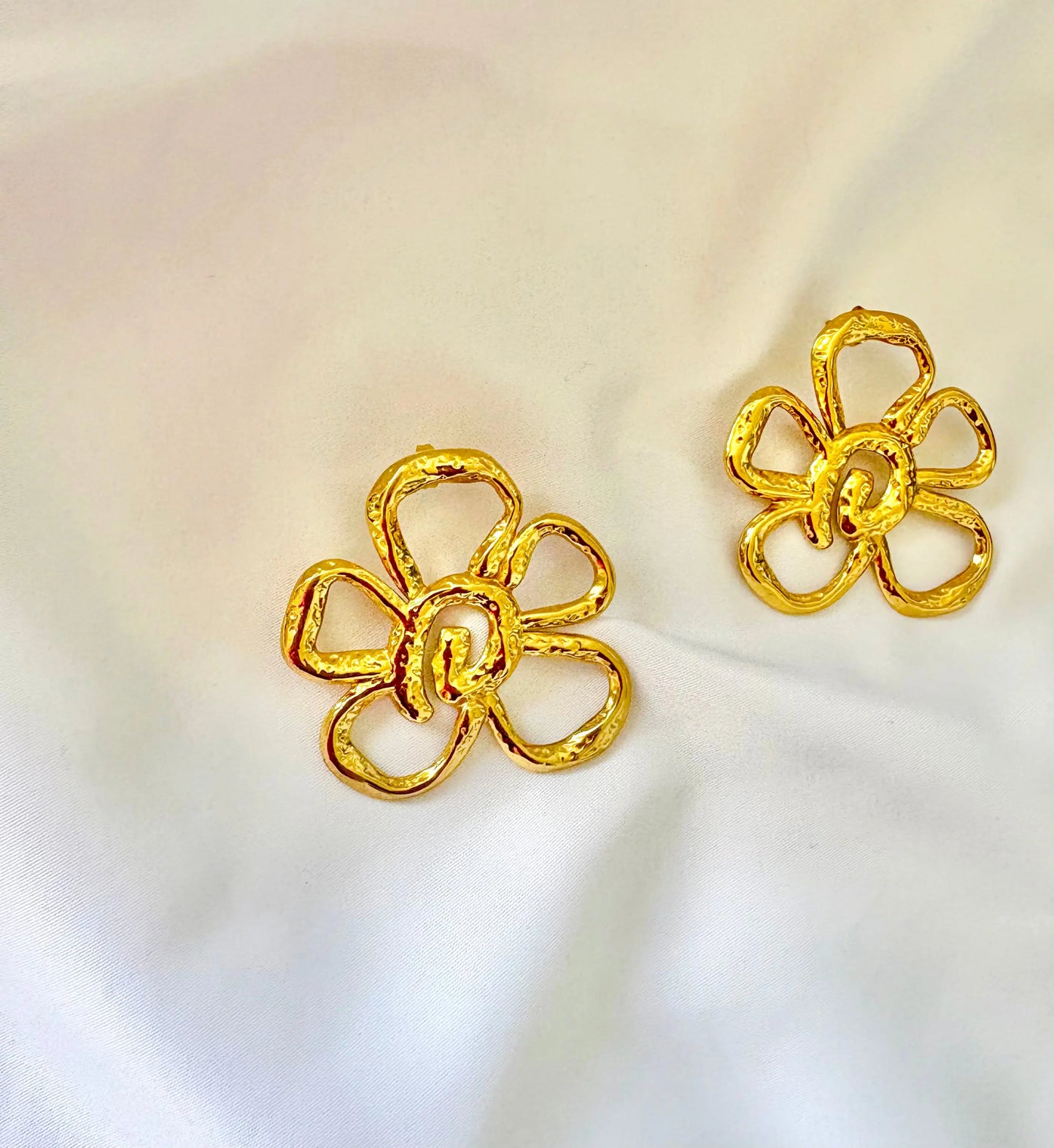 Textured gold flower jewelry