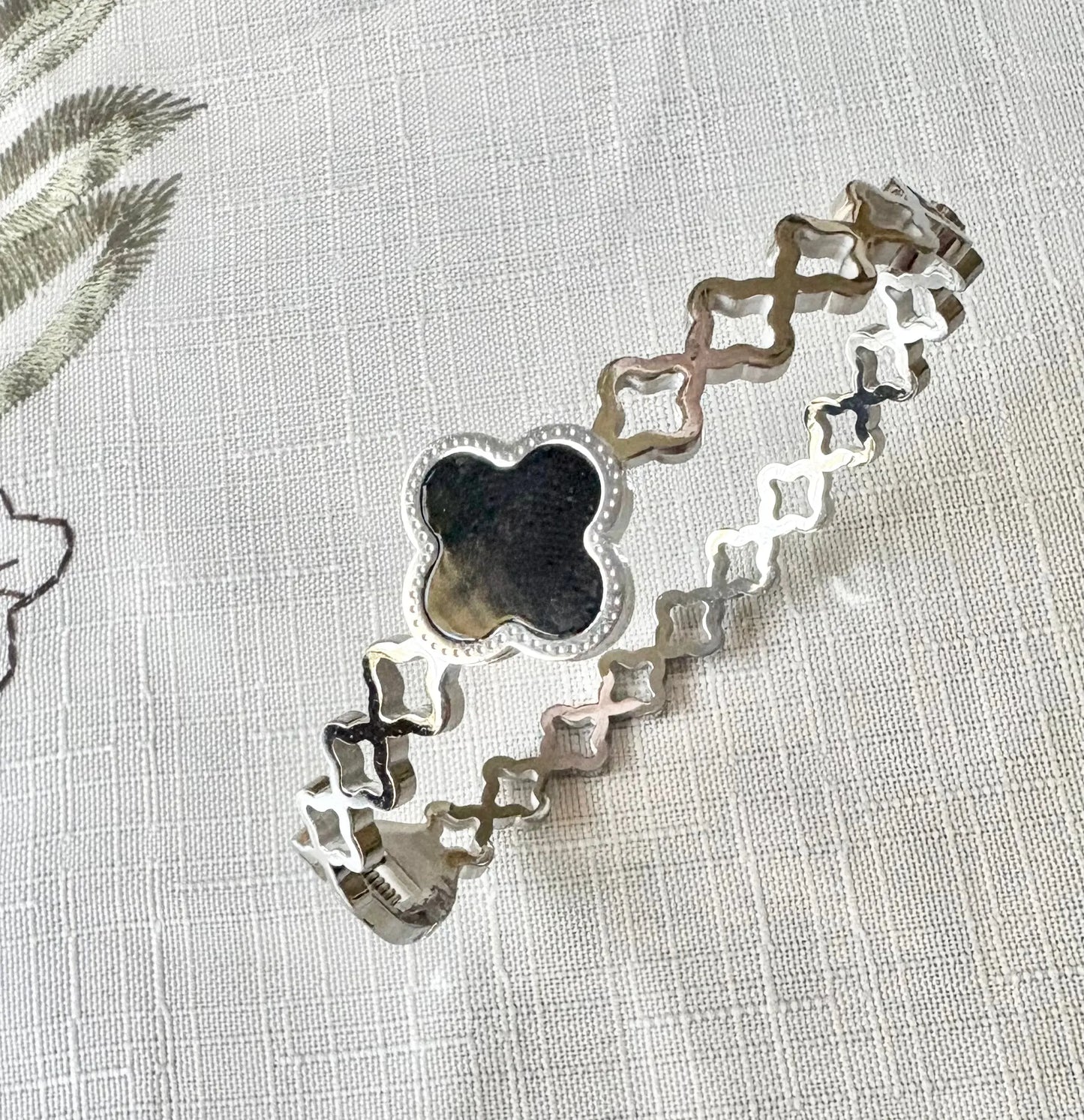 Silver Clover Cutout Bangle with Black Enamel Charm – 18K White Gold Plated Yahala Boutique