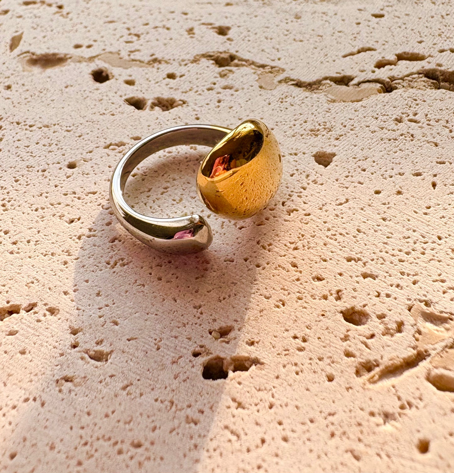 Close-up of silver and gold statement ring – size 7