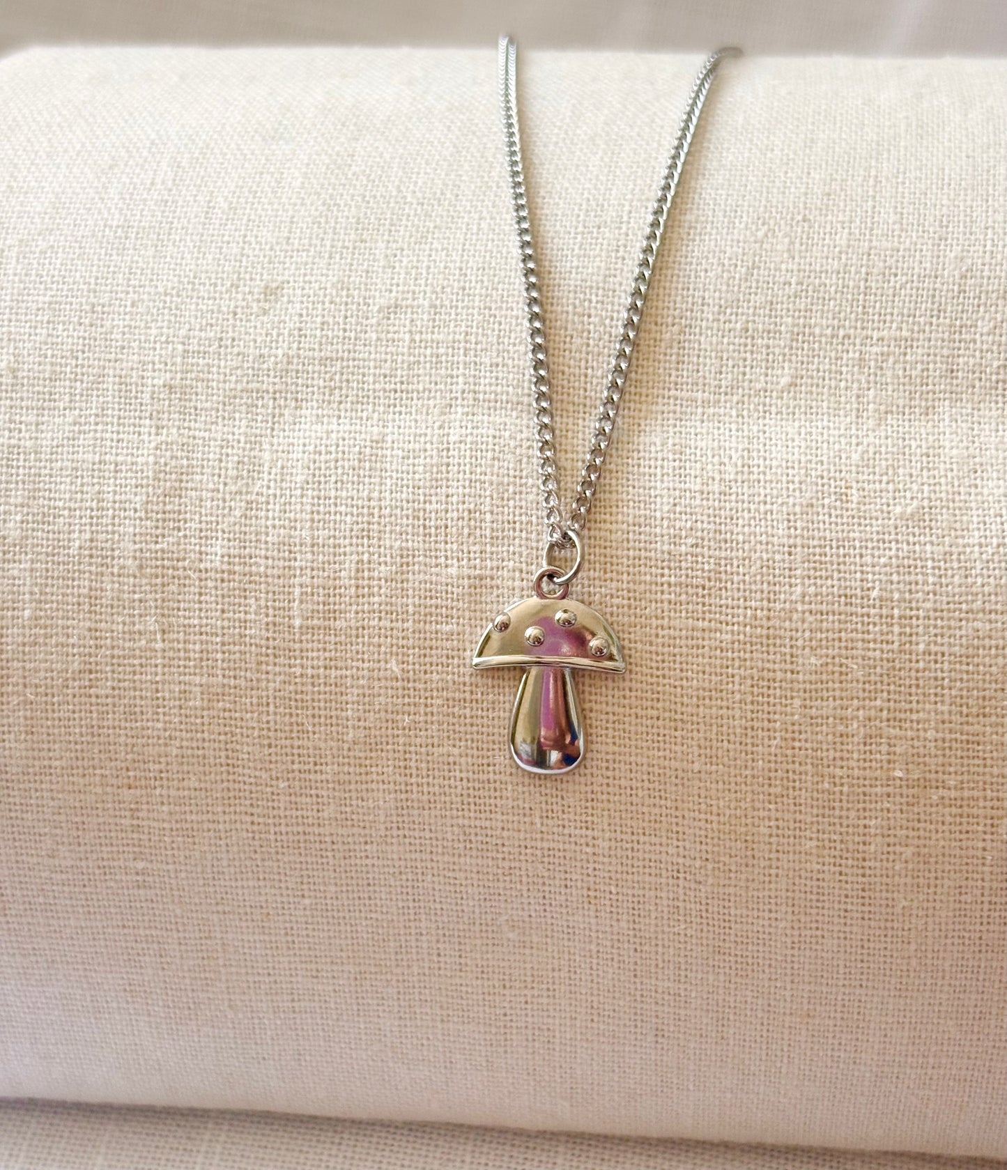 Silver necklace with a mushroom pendant
