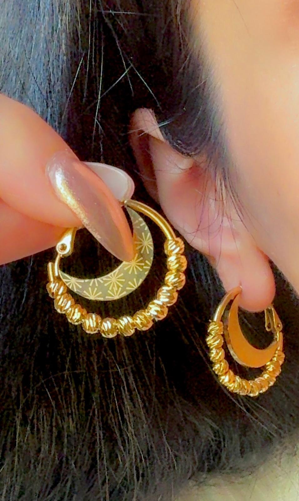 Modern gold hoop earrings with moon charm and textured beads