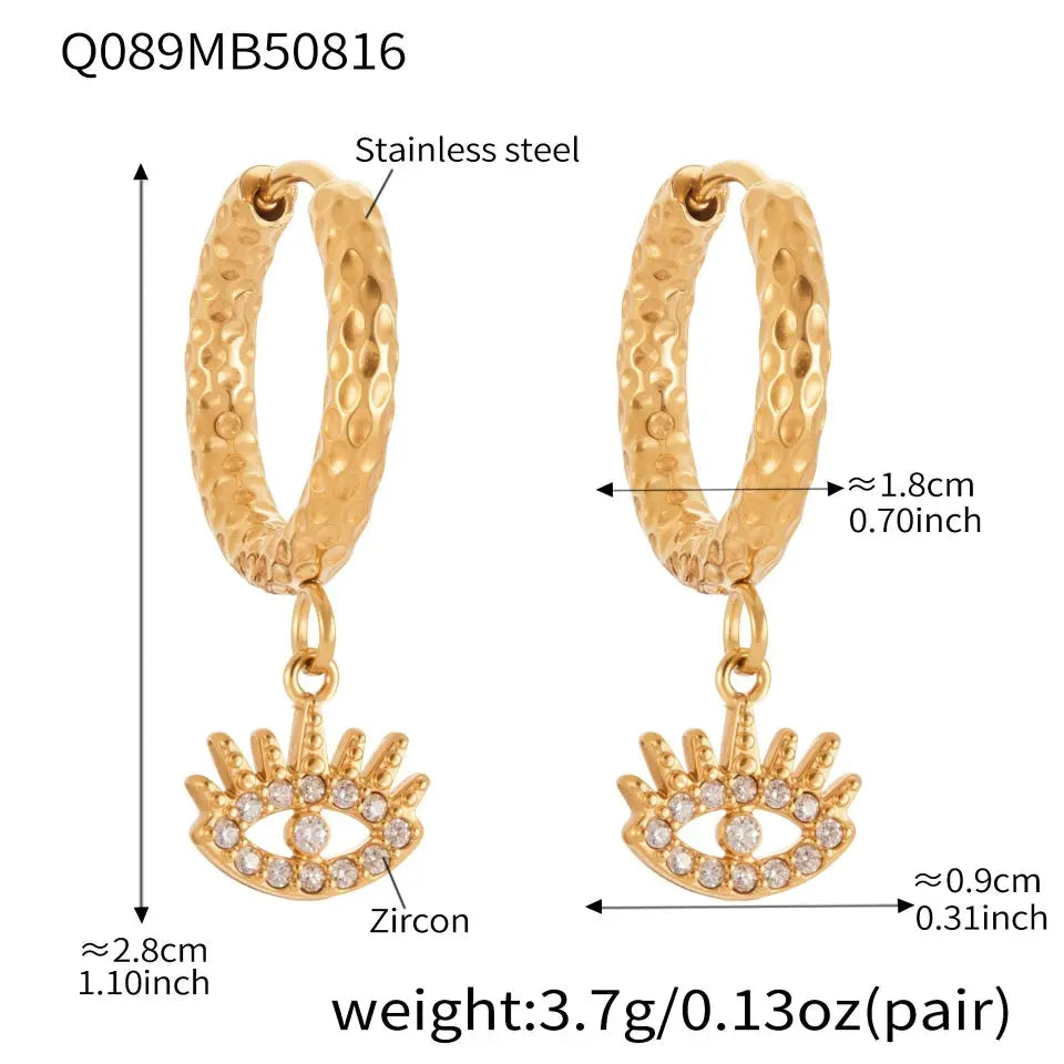 Gold hoop earrings with eye-shaped charms and measurements on a white background