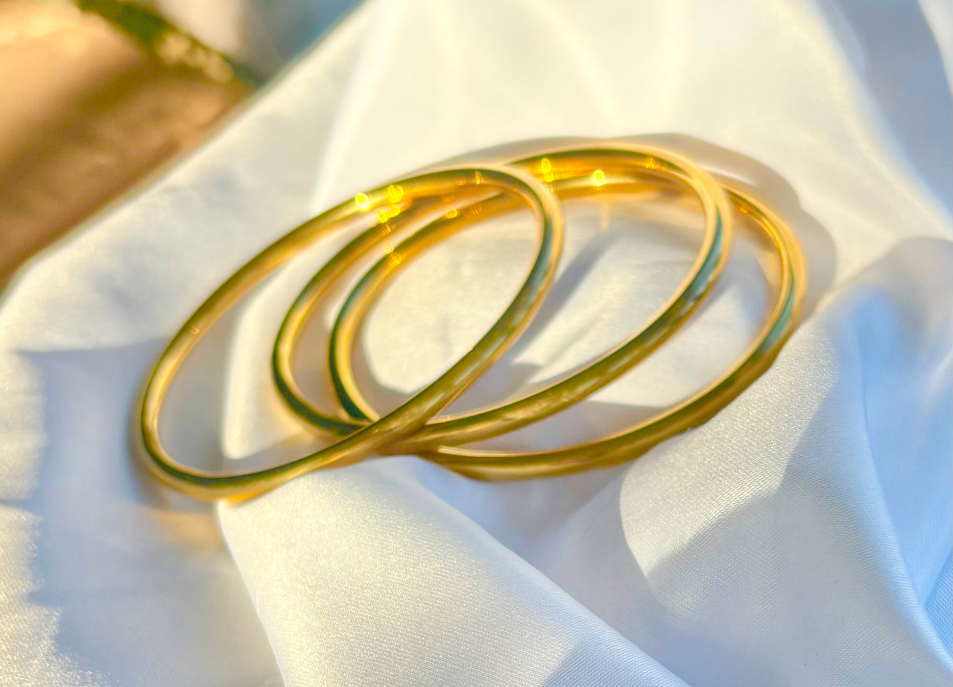 Three gold bangles set of 3