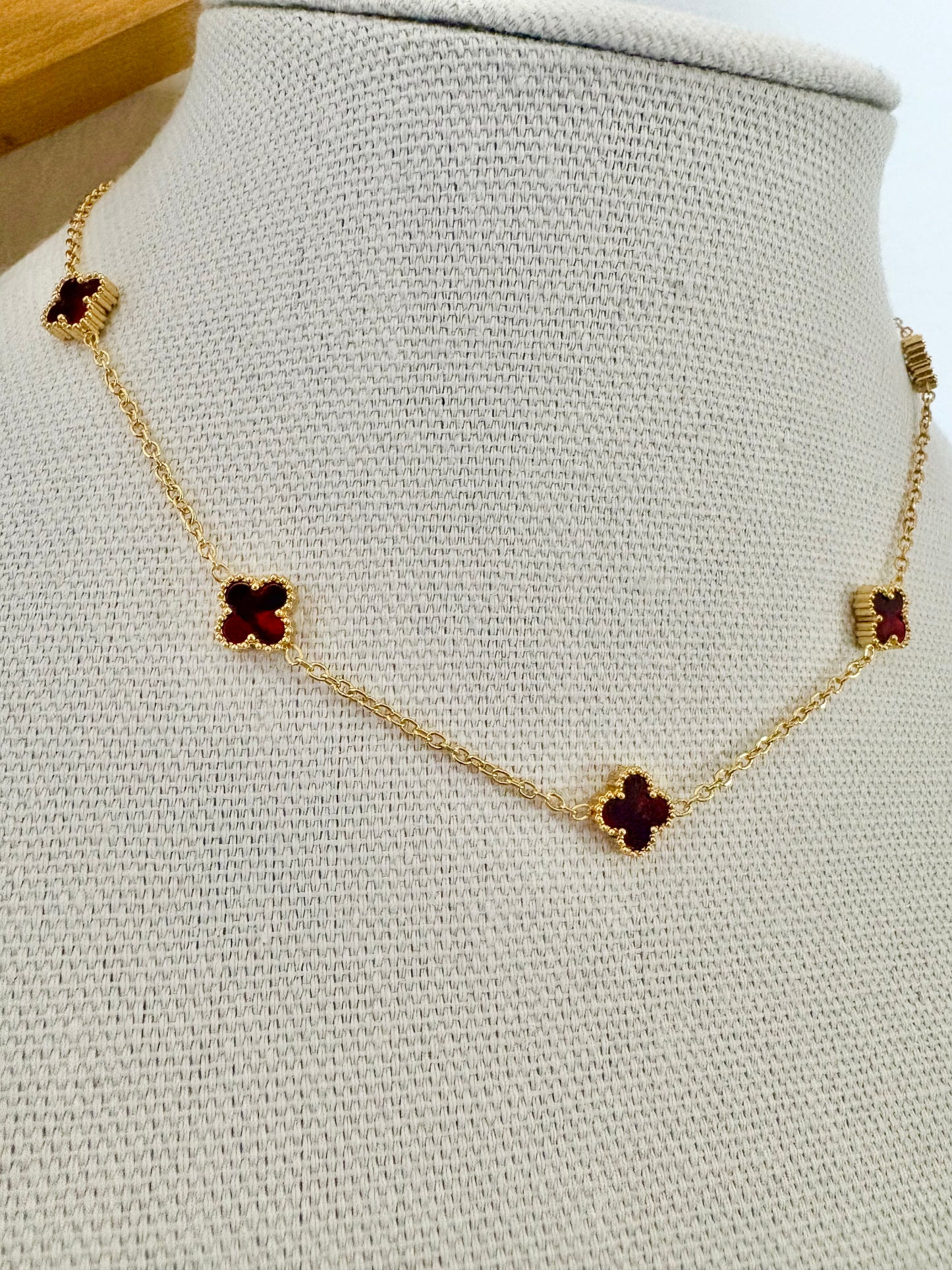 Gold necklace with red wine clovers