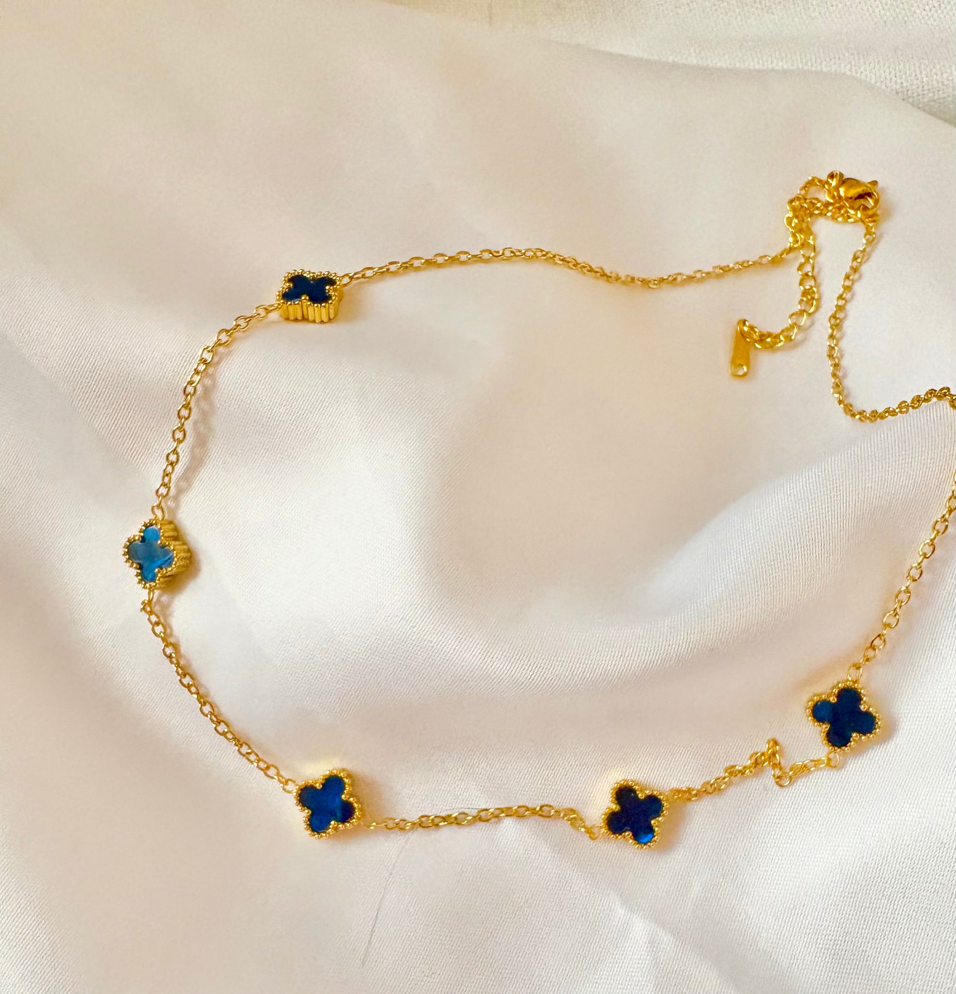 Navy blue clover station necklace in 18K gold plated stainless steel
