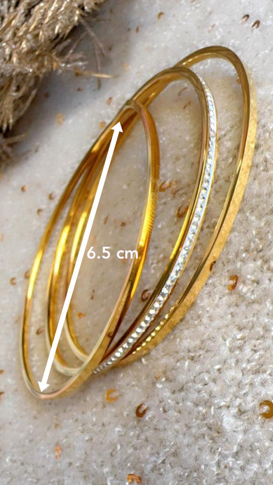 Dual Matching Bangles with a Sparkling Zircon Accent