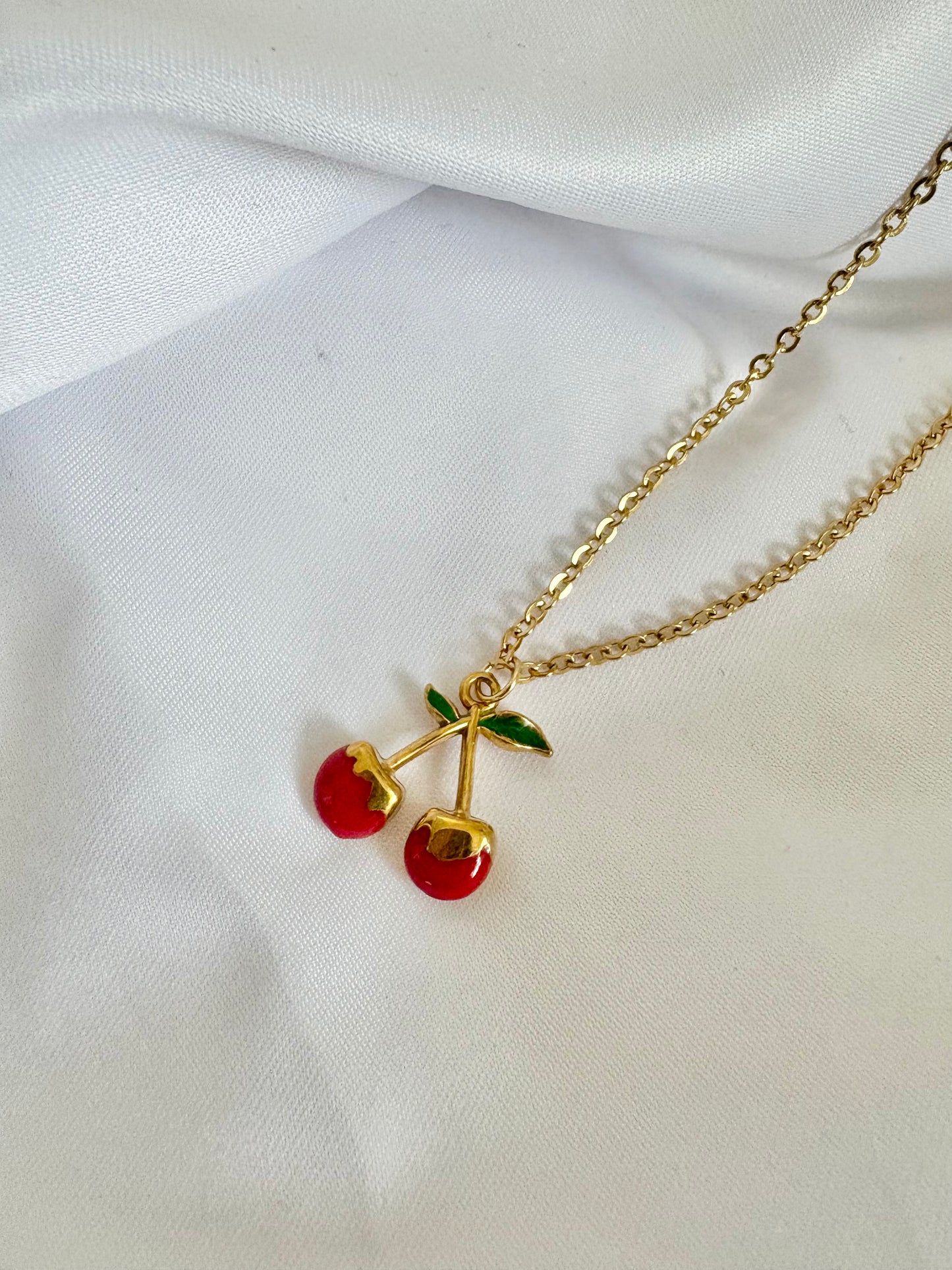 Cute cherry charm necklace on gold chain