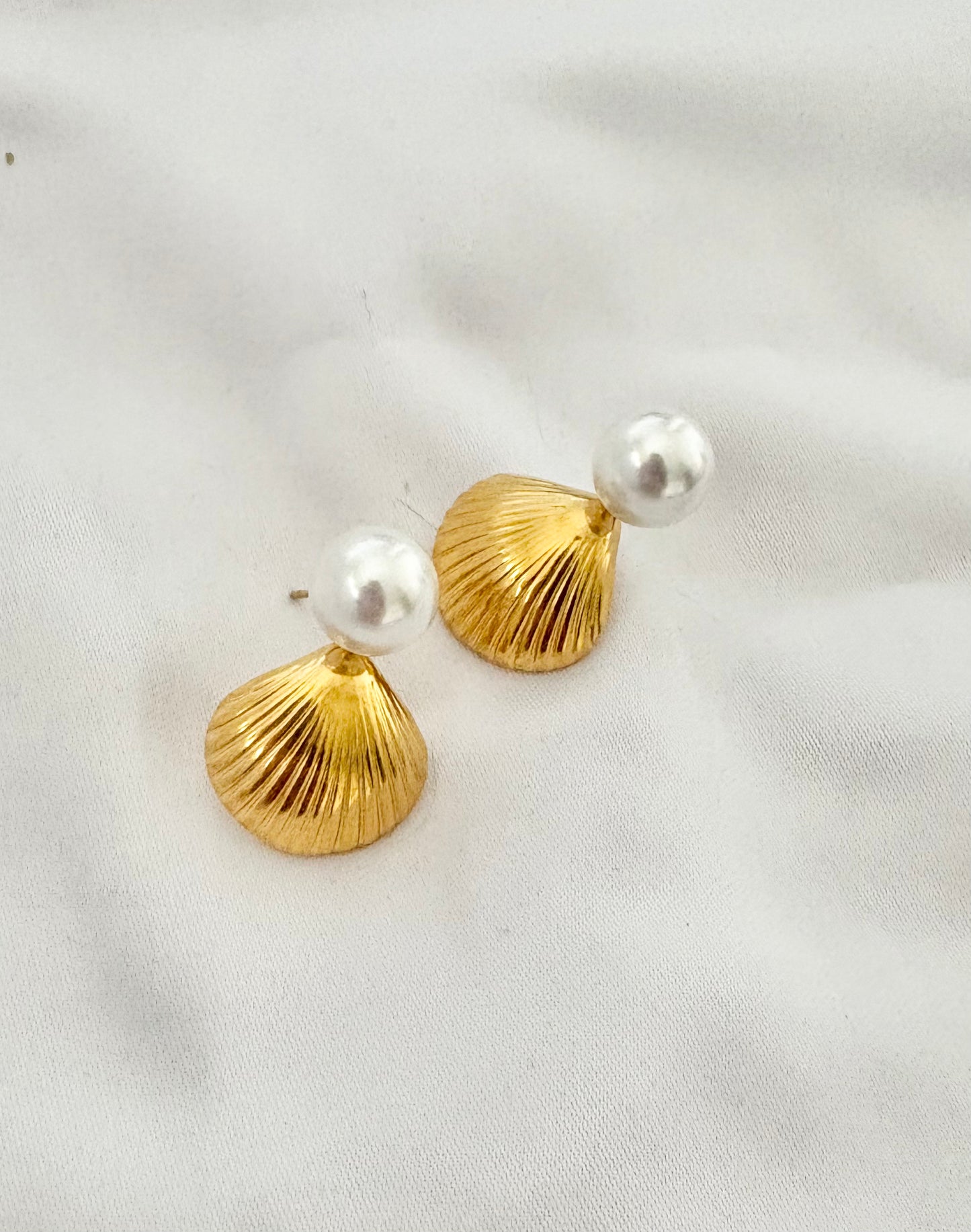 Minimal gold shell earrings with pearl detail