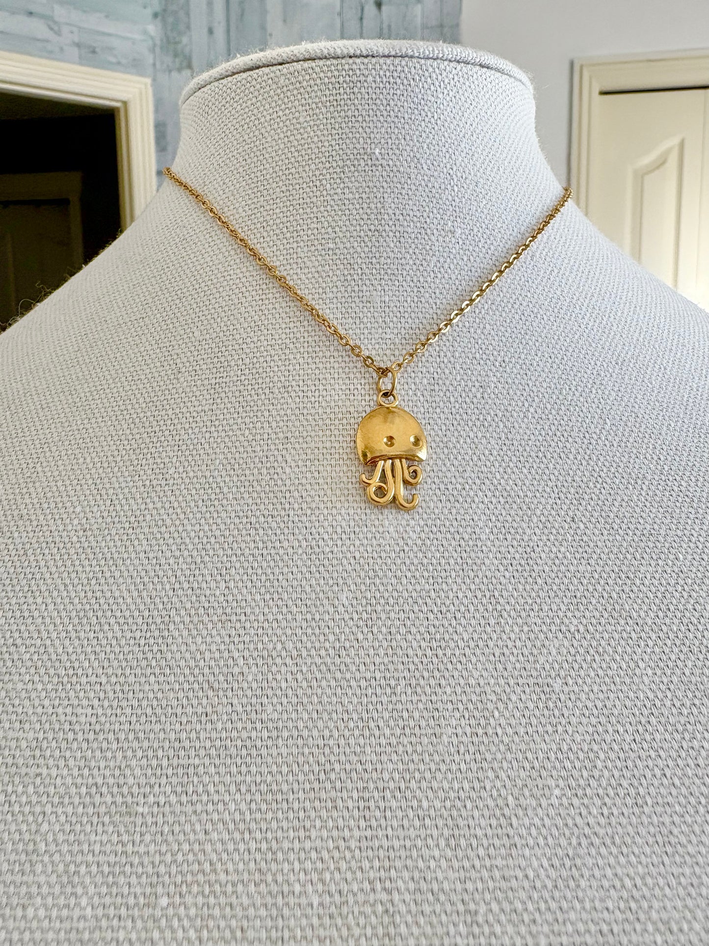Gold jellyfish pendant necklace