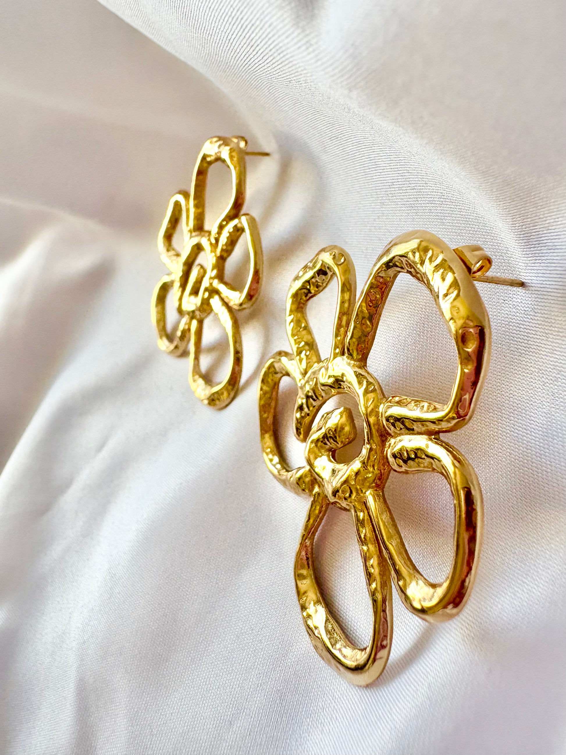 Gold flower statement stud earrings