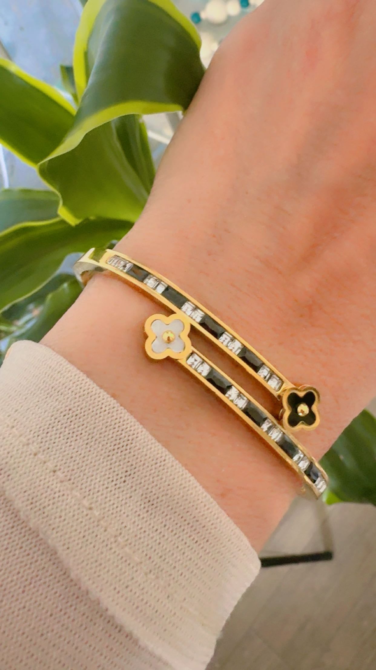 gold bracelet with black enamel