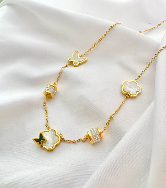 18K gold-plated butterfly and clover multi-charm necklace 