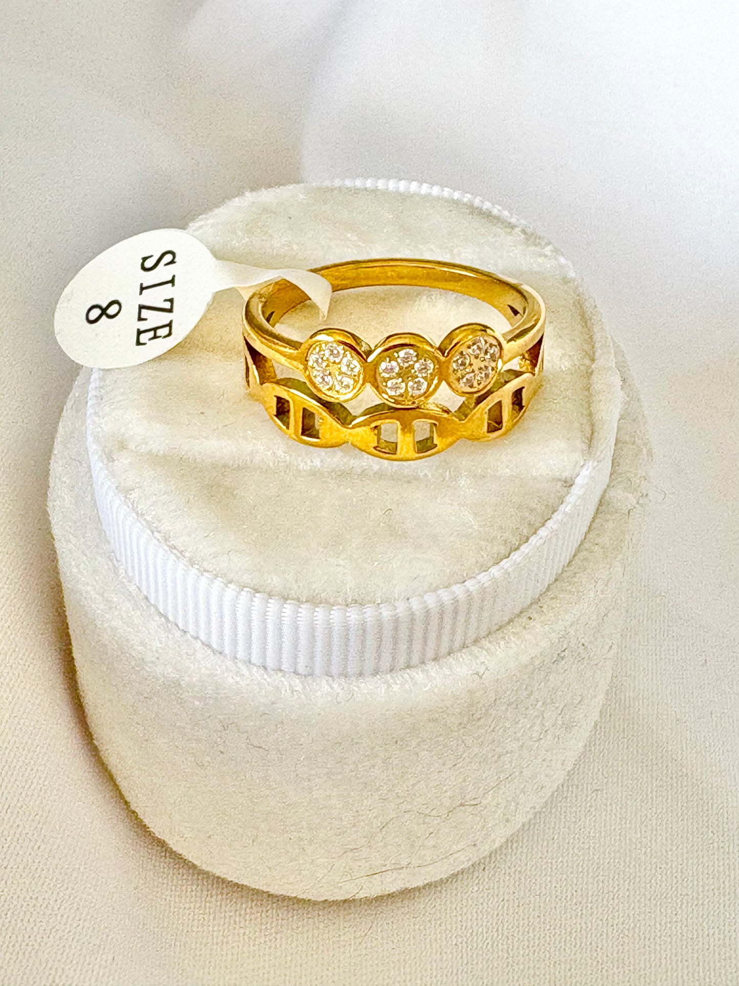 A gold ring with 2 layers size 8.
