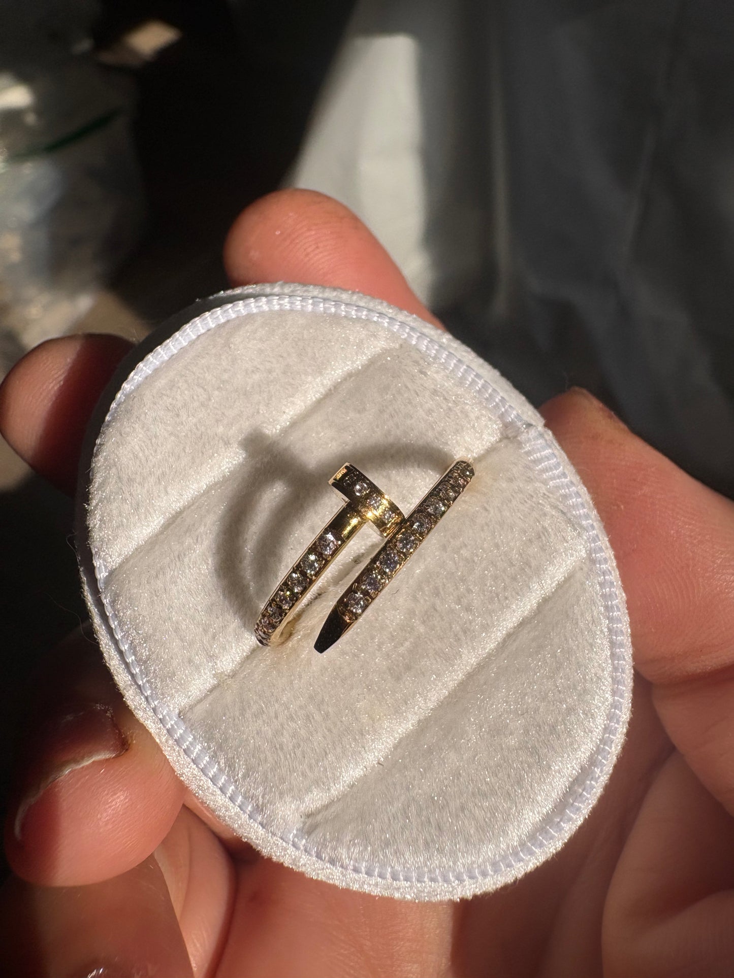 gold rings with small clear stones
