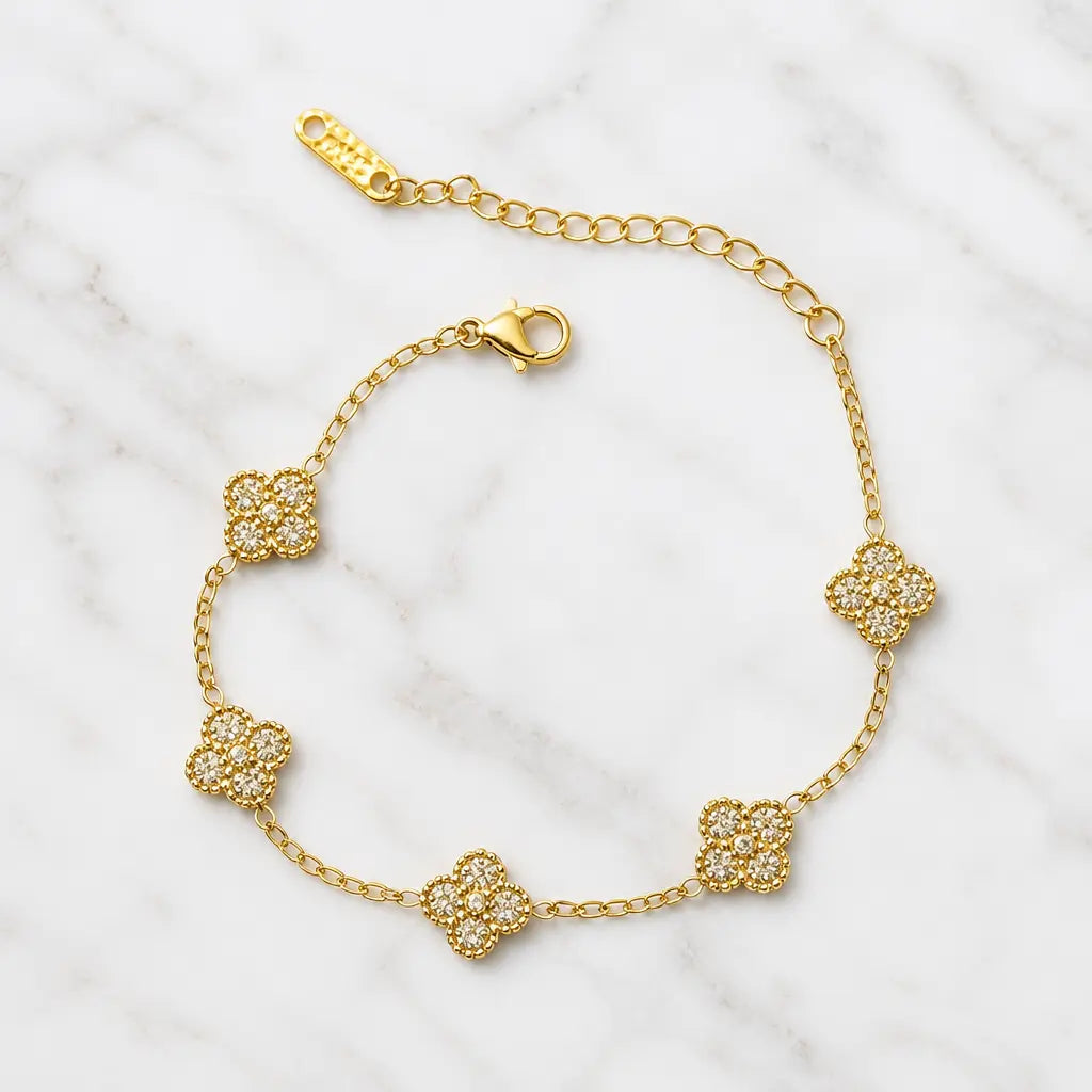 18k gold plated chain bracelet with five pavé-set zircon four-petal motifs
