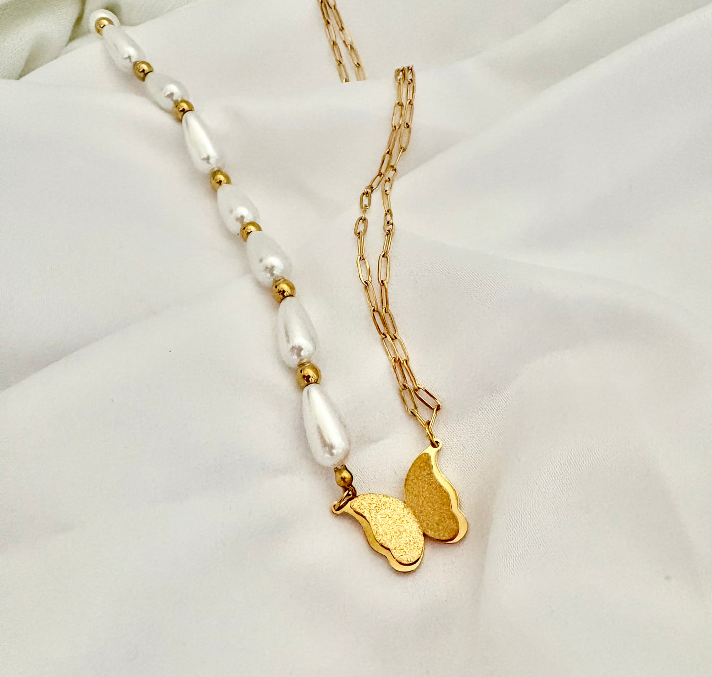 Gold butterfly pendant layered necklace with pearls and chain design (47–53 cm)
