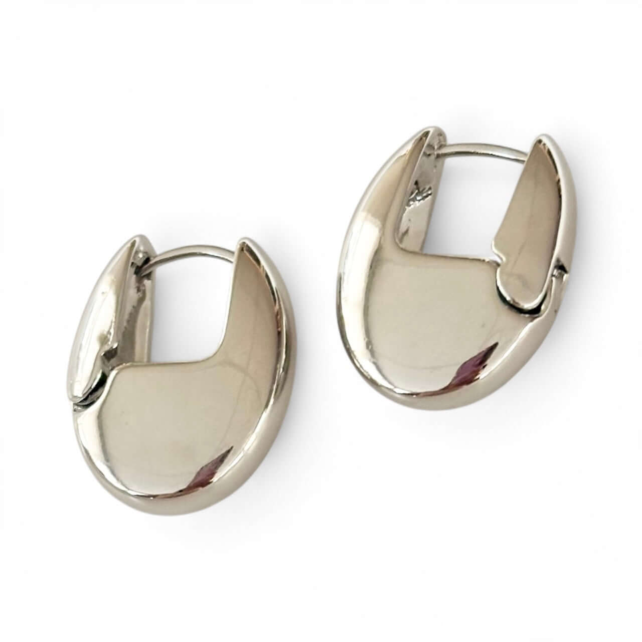 Pair of silver hoop earrings on a white background