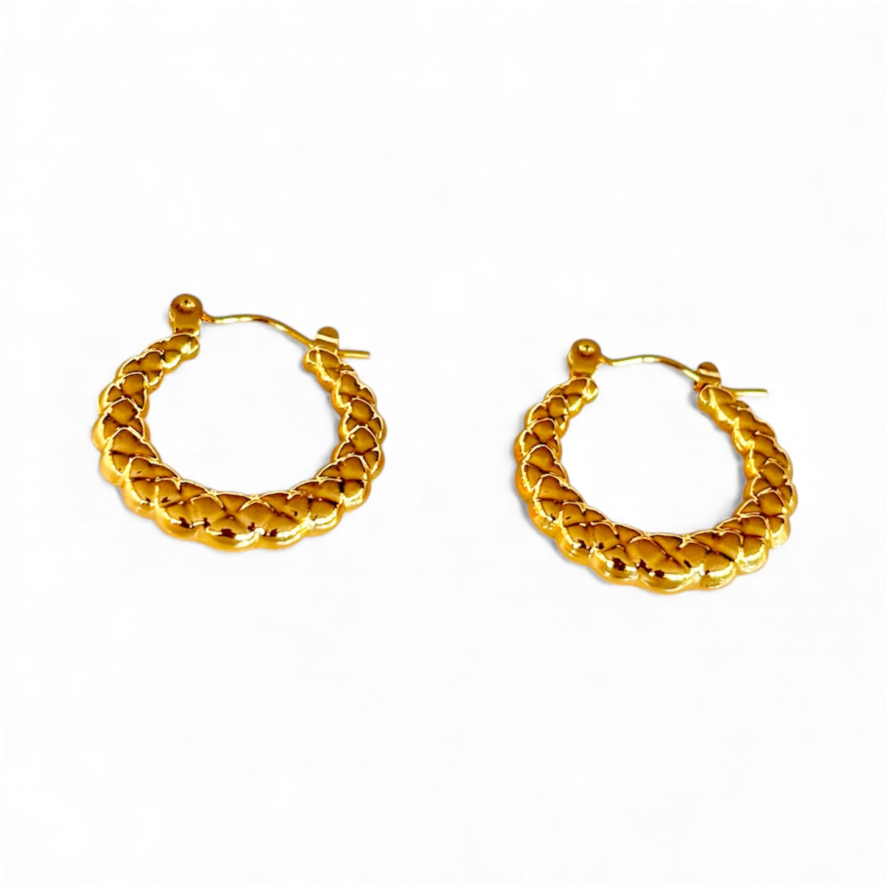 Front view of 2 cm braided gold hoop earrings with a woven, rope‑like design