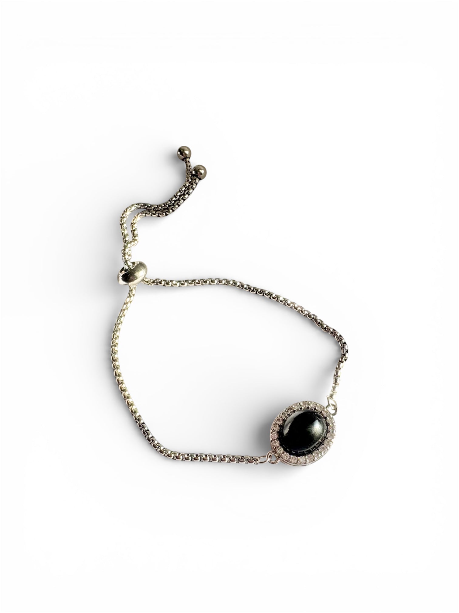 Adjustable black obsidian-style bracelet on white background