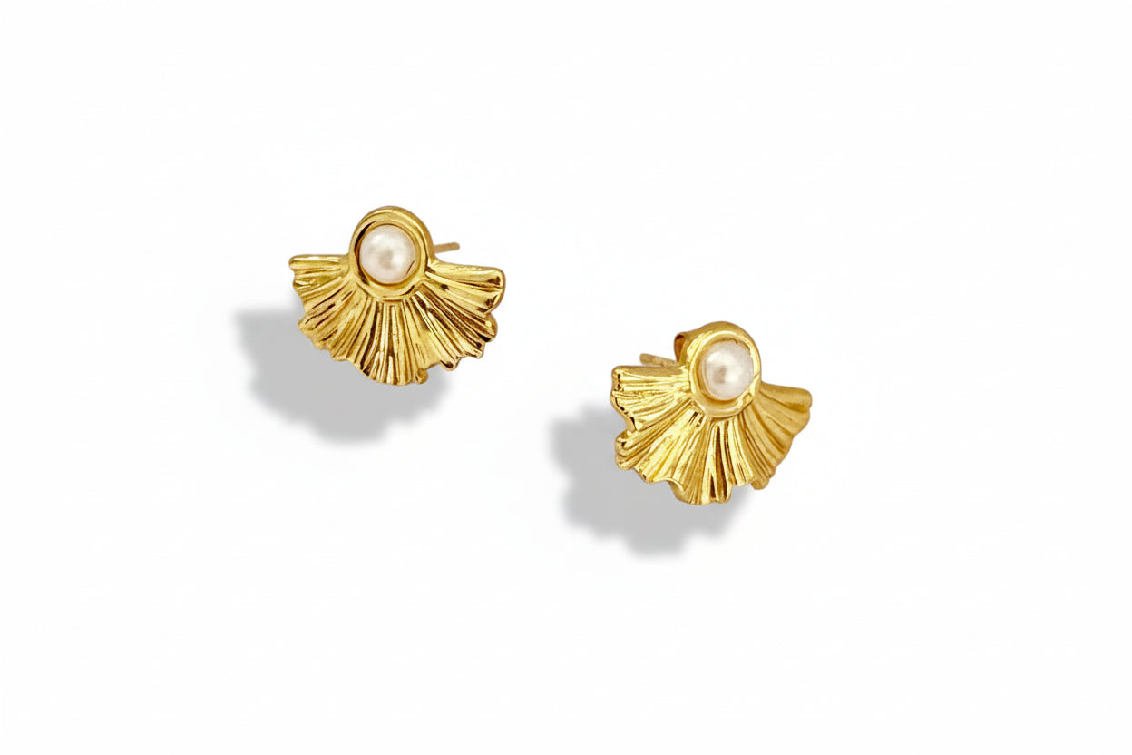 18k Gold Plated earrings with pearl centers on a white background