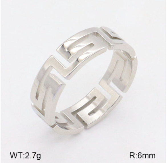 A silver-toned geometric band ring with a modern stepped, interlocking design