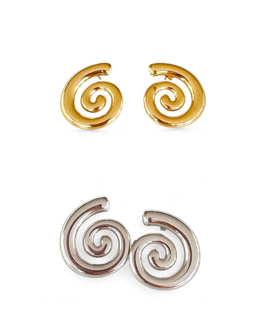 Pair of spiral-shaped earrings in gold and silver on a white background