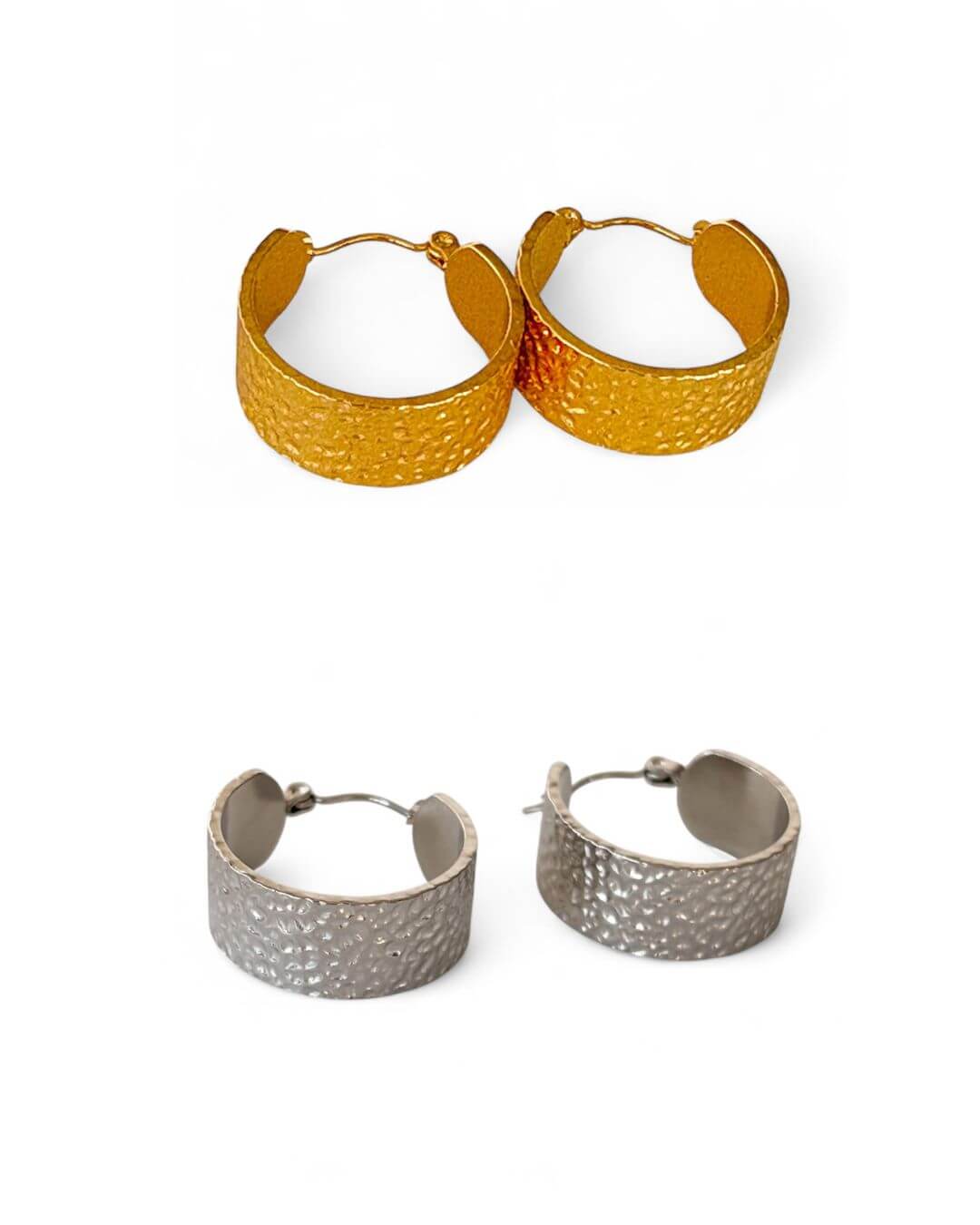 Two pairs of hoop earrings, one gold and one silver, on a white background.