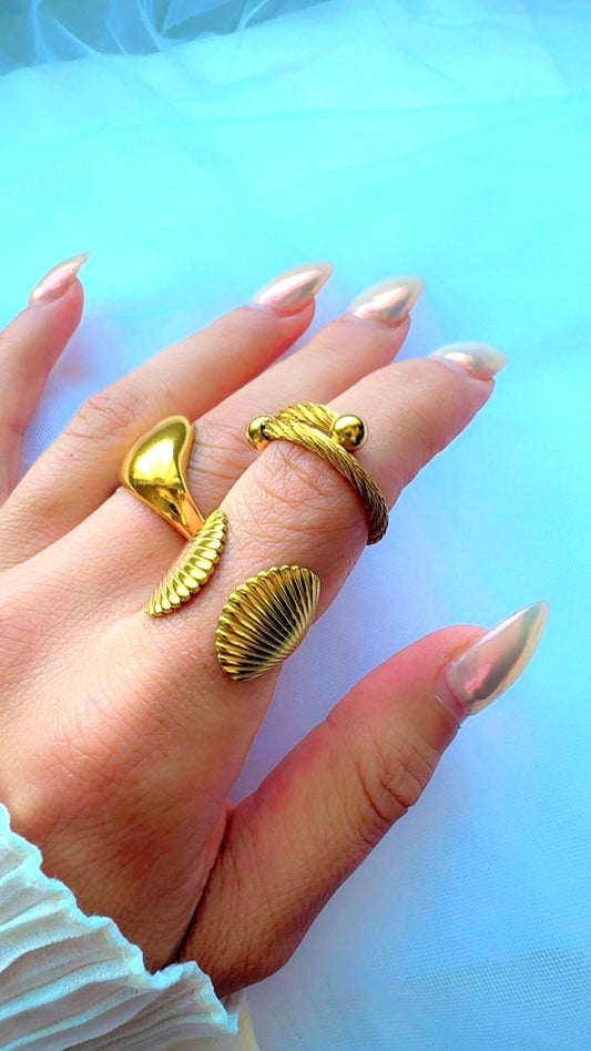 Close-up of minimalist gold cable ring with textured twist design