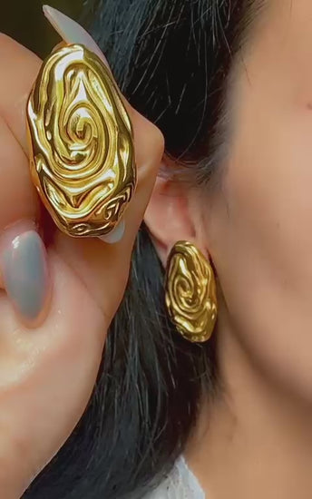Chunky gold swirl earrings for women, bold artistic jewelry style