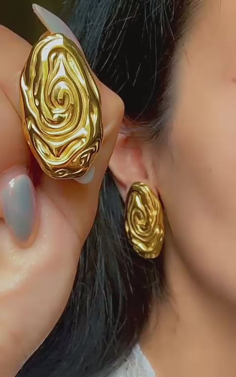 Chunky gold swirl earrings for women, bold artistic jewelry style